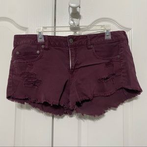 American Eagle low rise distressed maroon Jean short 14 2.5in inseam
